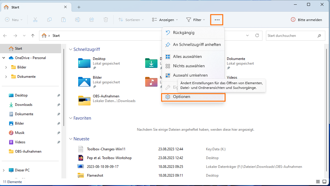 Der Windows Explorer. Drei Punkte in der obersten Zeile und der Menüpunkt "Optionen" sind orange umrandet.